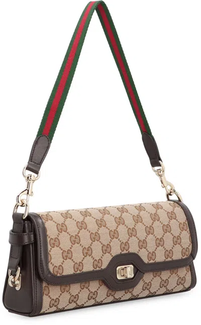 Shop Gucci Luce Fabric Shoulder Bag In Brown