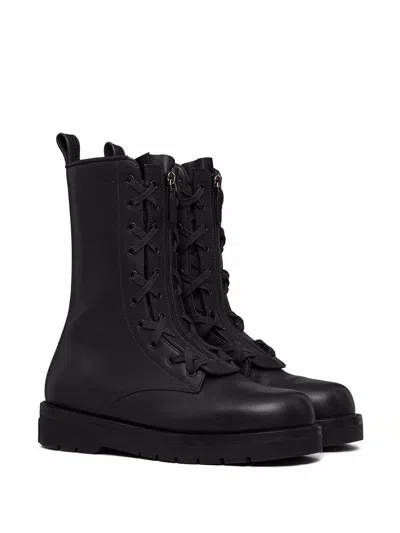 Shop Valentino Garavani Leather Combat Boots In Black