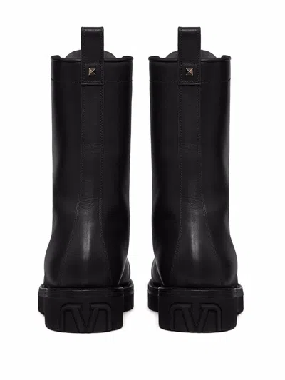 Shop Valentino Garavani Leather Combat Boots In Black