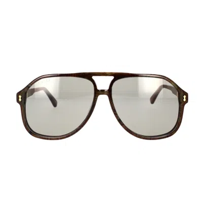 Shop Gucci Eyewear Sunglasses In Brown