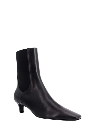 Shop Totême Boots In Black
