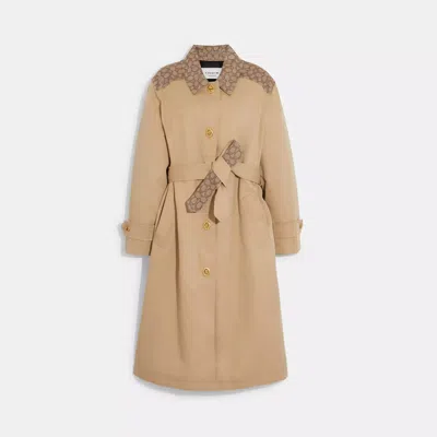 Shop Coach Outlet Signature Turnlock Trench In Beige