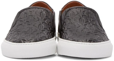 Shop Givenchy Black Trident Street Skate Slip-on Sneakers