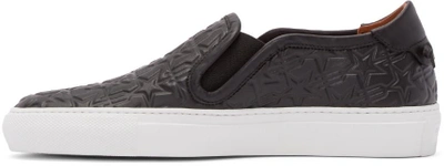 Shop Givenchy Black Trident Street Skate Slip-on Sneakers