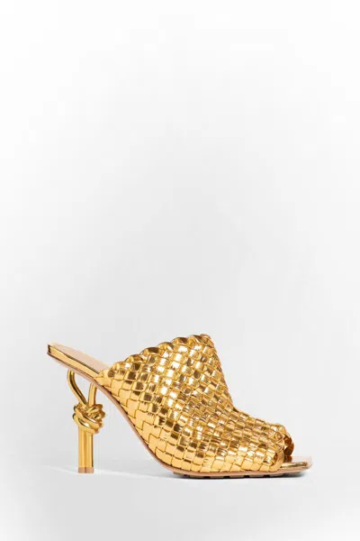 Shop Bottega Veneta Sandals In Gold