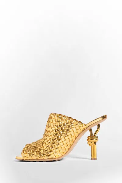 Shop Bottega Veneta Sandals In Gold