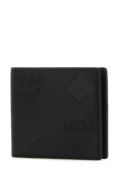 Shop Mcm Wallets In Black