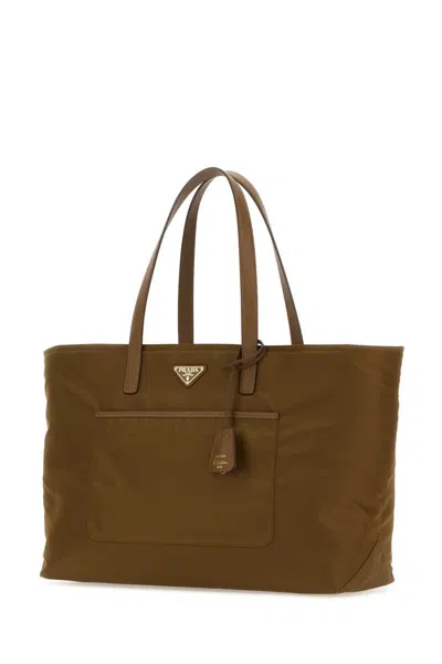 Shop Prada Handbags. In Brown
