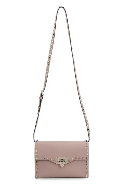 Shop Valentino Garavani - Rockstud Leather Crossbody Bag In Pink