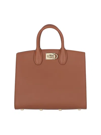 Shop Ferragamo Bags In Brown