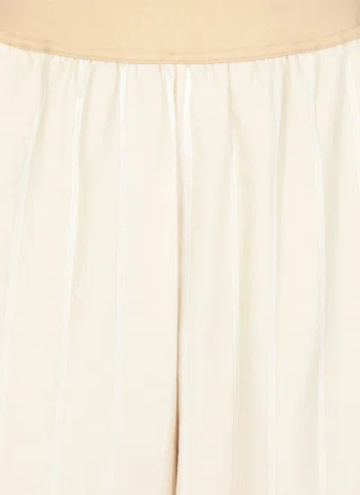 Shop Uma Wang Trousers Beige