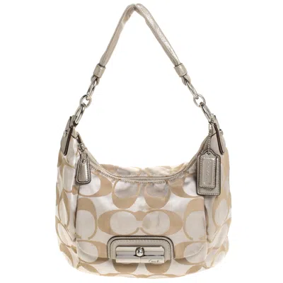 Shop Coach /gold Canvas And Leather Kristin Hobo In Beige