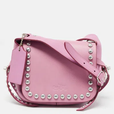 Shop Coach Leather Rivet Dakotah Crossbody Bag In Pink