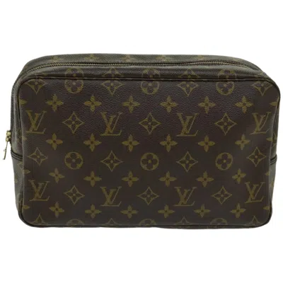 Pre-owned Louis Vuitton Trousse De Toilette Canvas Clutch Bag () In Brown