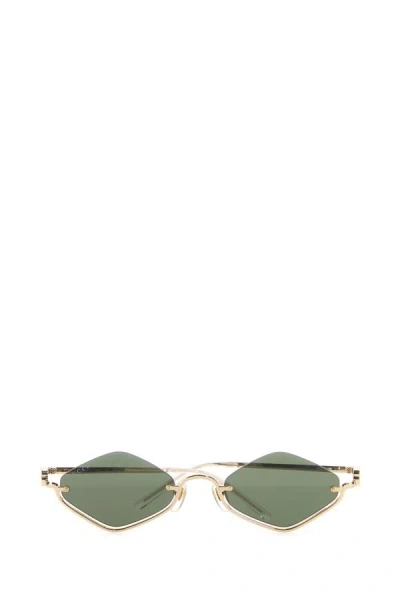 Shop Gucci Woman Gold Metal Sunglasses