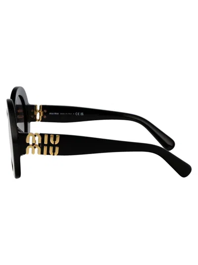 Shop Miu Miu Sunglasses In 1ab5d1 Black