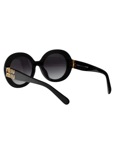Shop Miu Miu Sunglasses In 1ab5d1 Black