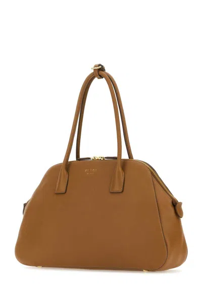 Shop Prada Handbags. In Camel