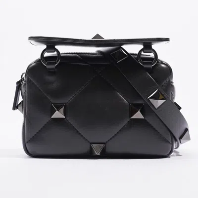 Shop Valentino Small Roman Stud Leather Crossbody Bag In Black