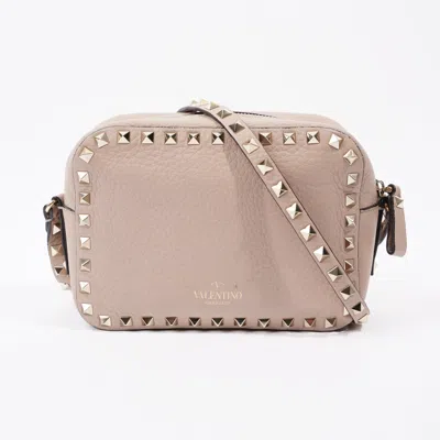 Shop Valentino Rockstud Camera Dusty Grained Leather Crossbody Bag In Gold