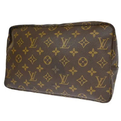 Pre-owned Louis Vuitton Trousse Toilette 28 Brown Canvas Clutch Bag ()