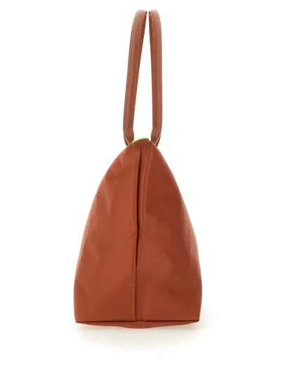 Shop Longchamp Le Pliage Large Bag In Brown