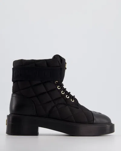 Pre-owned Chanel Nylon And Leather Padded Boots With Cc Logo Detail In Black