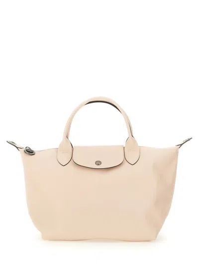 Shop Longchamp Le Pliage Small Bag In Ivory