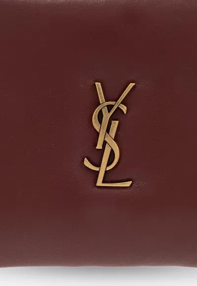 Shop Saint Laurent Calypso Embellished Logo Pouch Bag In Burgundy