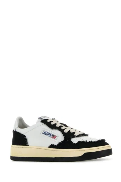 Shop Autry Leather And Canvas Sneakers In White/black