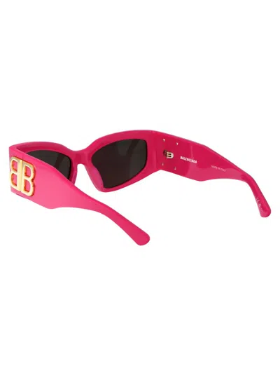 Shop Balenciaga Sunglasses In 006 Pink Pink Grey