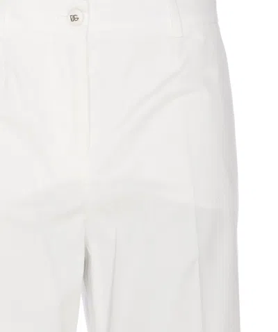 Shop Dolce & Gabbana Flare Pants In White