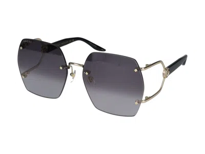 Shop Gucci Sunglasses In 001 Gold Black Grey