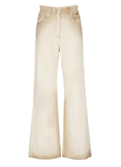 Shop Msgm Cotton Jeans With Faded Effect And Frayed Edges In Beige