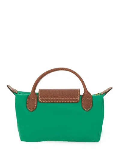 Shop Longchamp "le Pliage" Clutch Bag With Handle In Green
