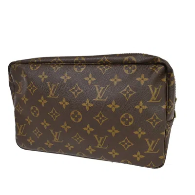 Pre-owned Louis Vuitton Trousse Toilette 28 Brown Canvas Clutch Bag ()