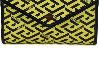 Shop Versace Radiant Yellow Canvas-leather Pouch Shoulder Women's Bag