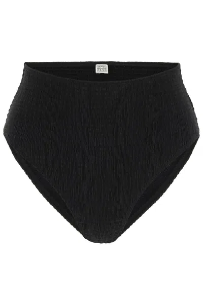 Shop Totême High-waisted Bikini Bottom In Nero