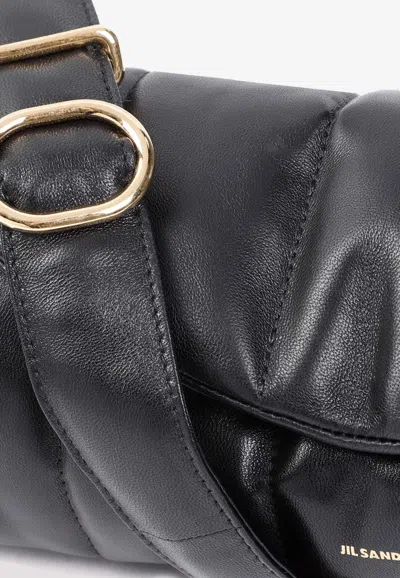 Shop Jil Sander Cannolo Padded Shoulder Bag In Black
