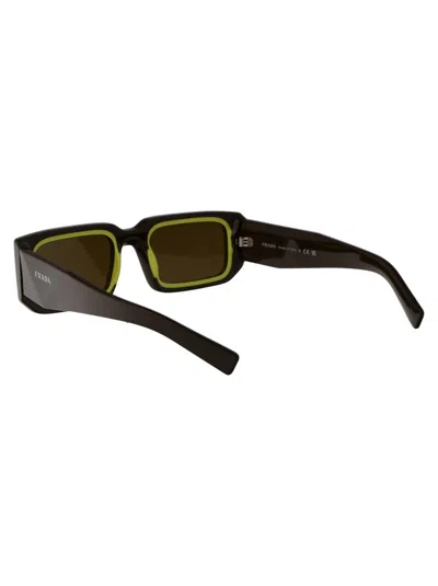 Shop Prada Sunglasses In 15m01t Loden/cedar