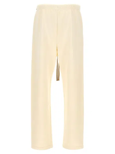 Fear Of God 'tailored Assembly' Trousers Featuring Elastic Waistband In Beige