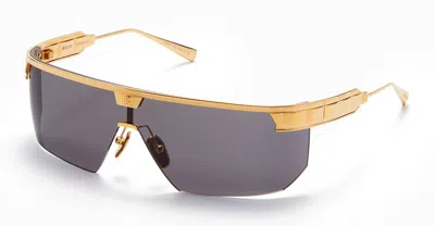 Shop Balmain Sunglasses In Gold