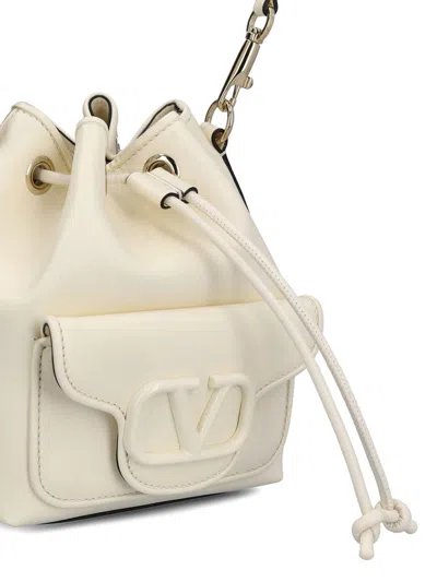 Shop Valentino Garavani Handbags In White