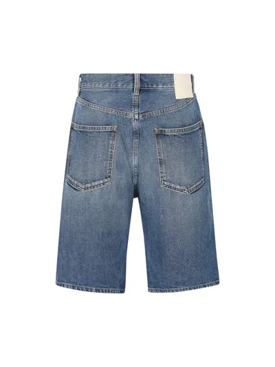 Shop Valentino Garavani Shorts In Blue Denim
