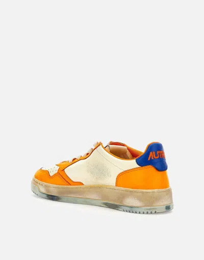 Shop Autry Sneakers In White-orange-blue
