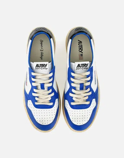 Shop Autry Sneakers In White-blue-black