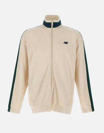 Shop New Balance Sweaters In White