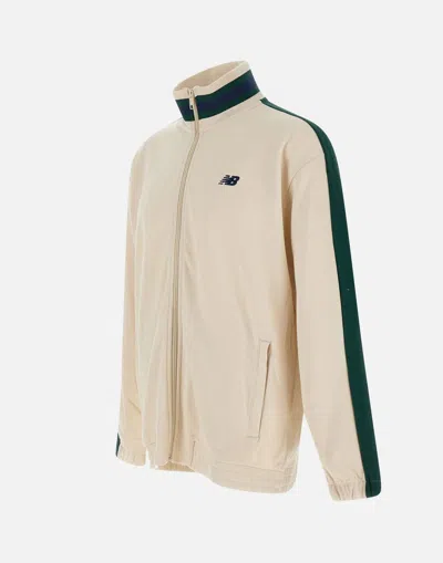 Shop New Balance Sweaters In White