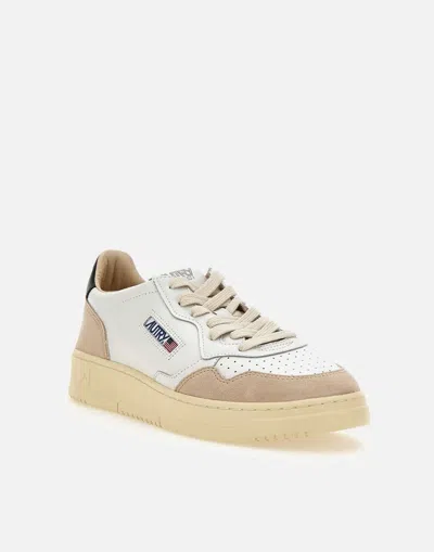 Shop Autry Sneakers In White