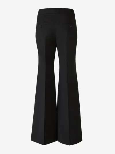 Shop Givenchy Crepe Flare Trousers In Black